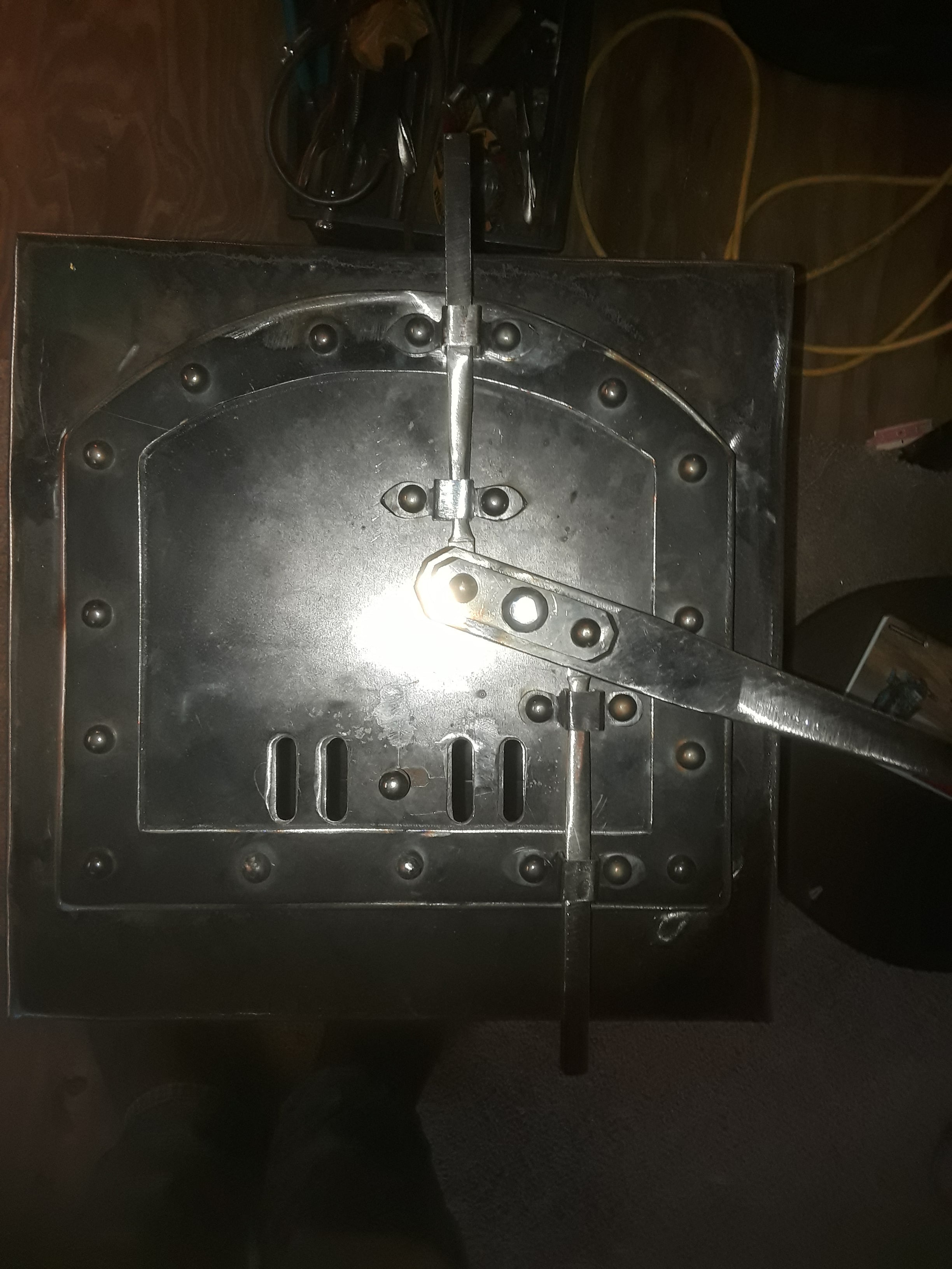 Hand-Built Steel Outdoor Firebox – Riveted Door & Old-World Latch