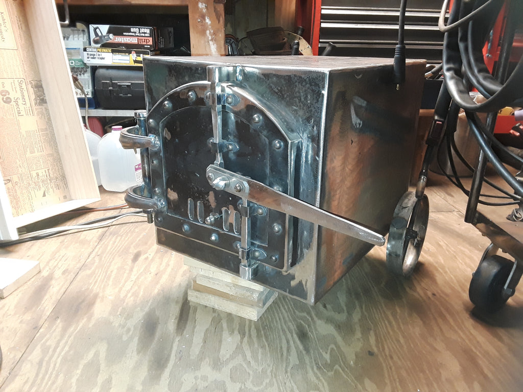 Hand-Built Steel Outdoor Firebox – Riveted Door & Old-World Latch